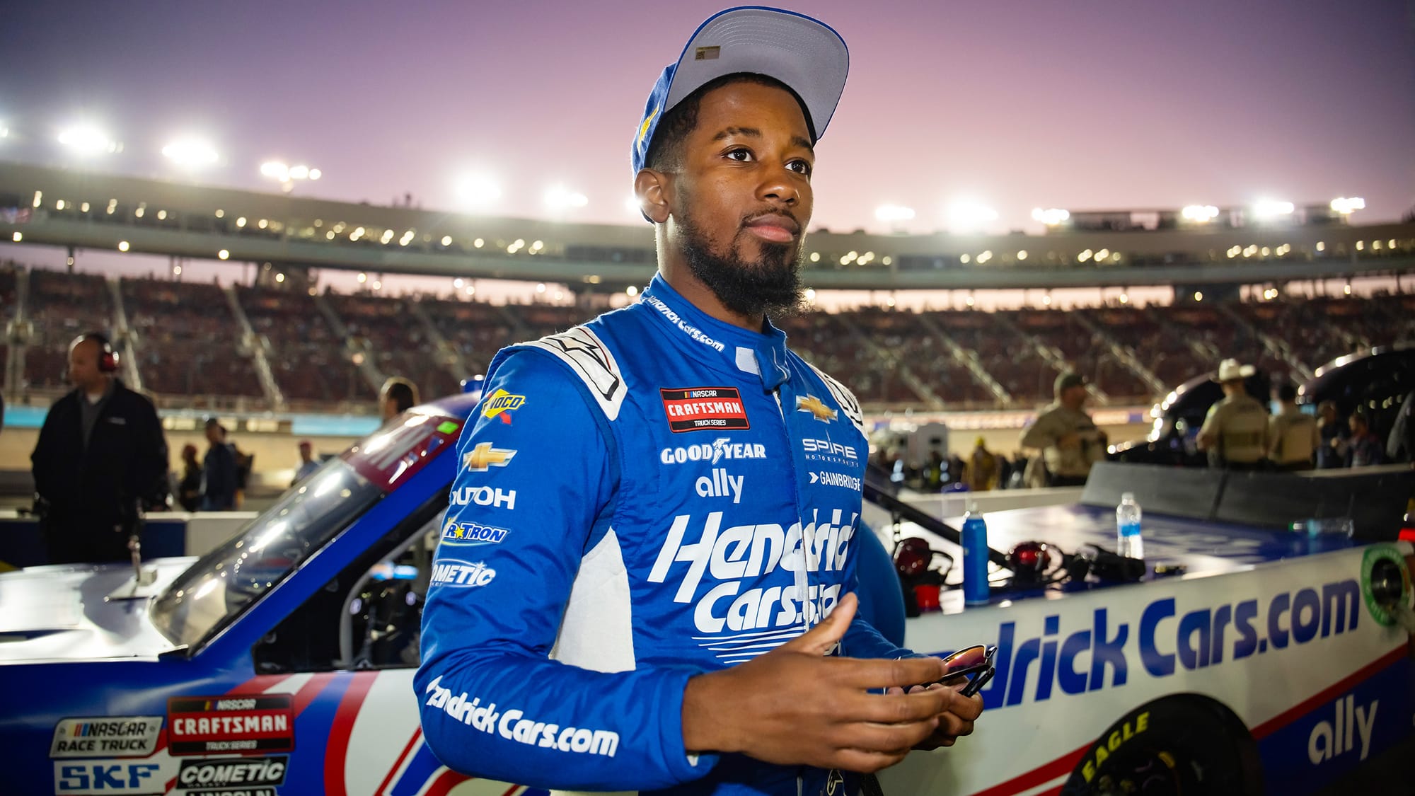 Rajah Carruth stands after finishing 13th in the NASCAR Truck Series championship race at Phoenix Raceway on Nov. 8, 2024.