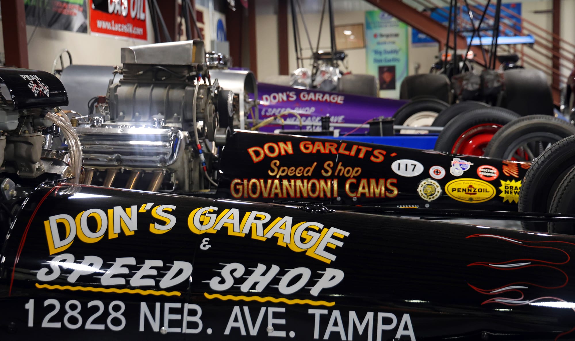 Three of Don Garlits' former dragsters sit inside his museum on Monday, Sept. 15, 2025.