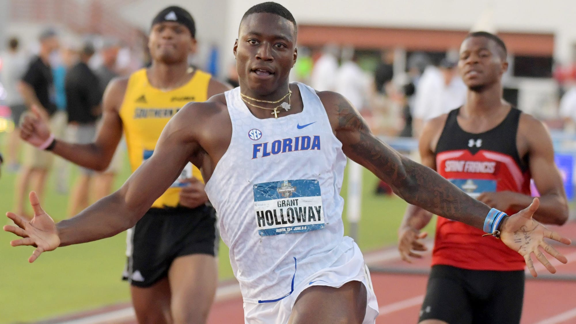 Grant Holloway (Florida) celebrates after winning  the 110-meter hurdles in a collegiate-record 12.98 during the NCAA Track & Field Championships at Mike A. Myers Stadium on June 7, 2019, in Austin, Texas.